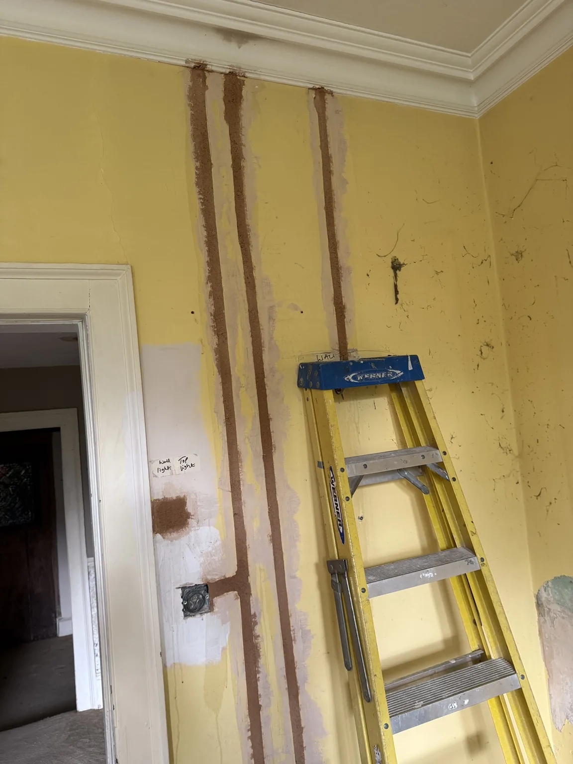 Vertical cable chases during the listed building rewire in Bath