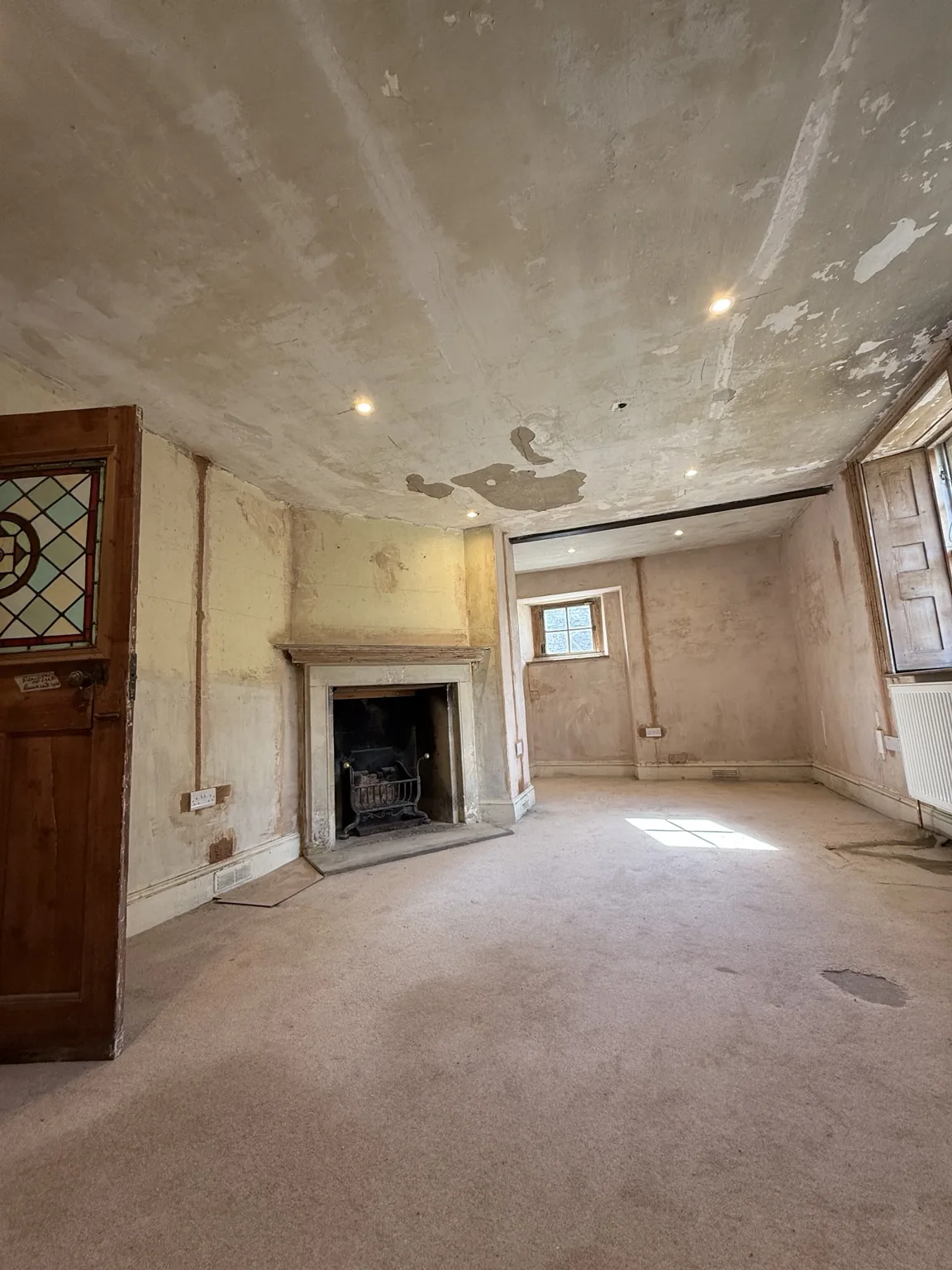 Finished lighting installation in a large room of the Bath period property
